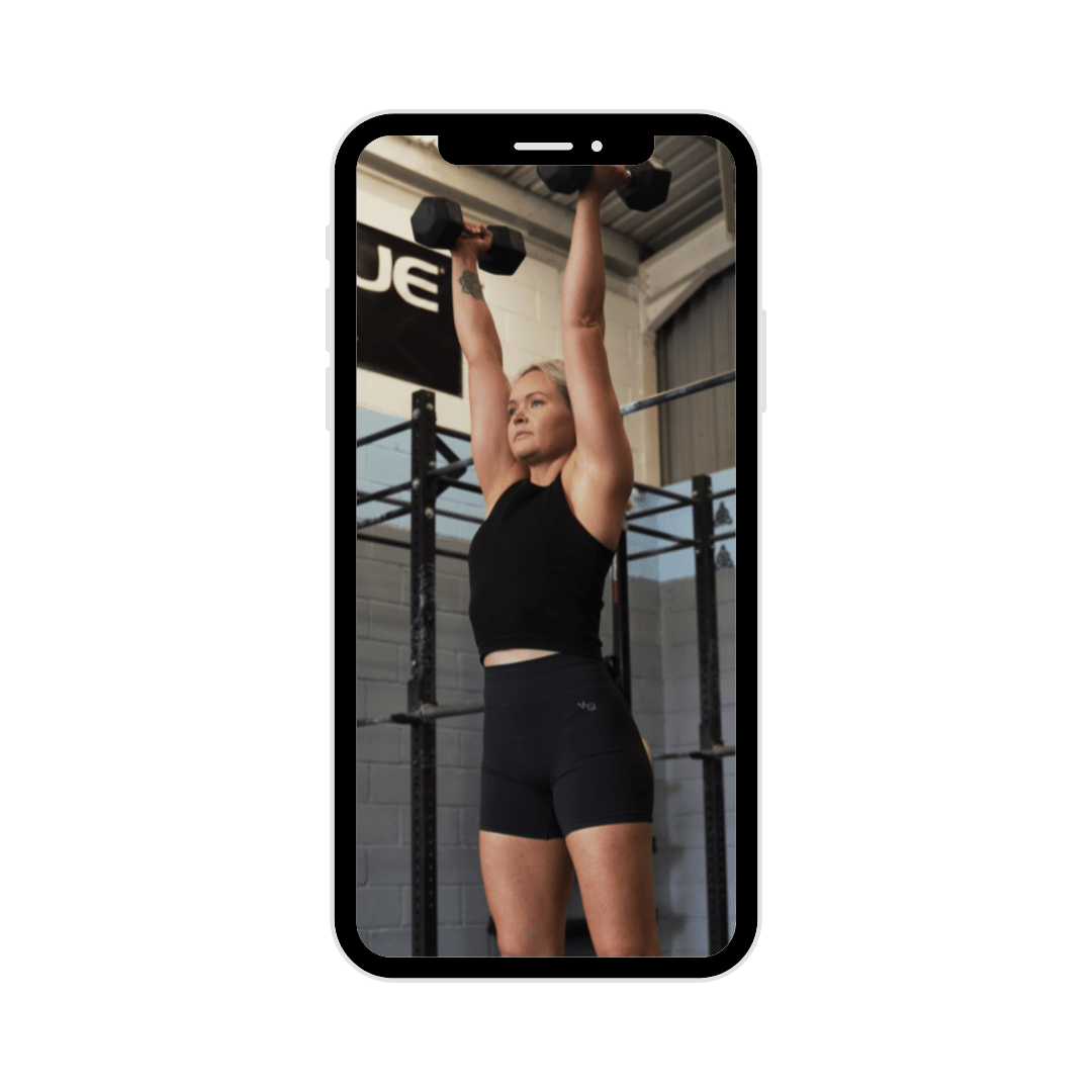 iPhone with a photo inside of Anita doing arm workout